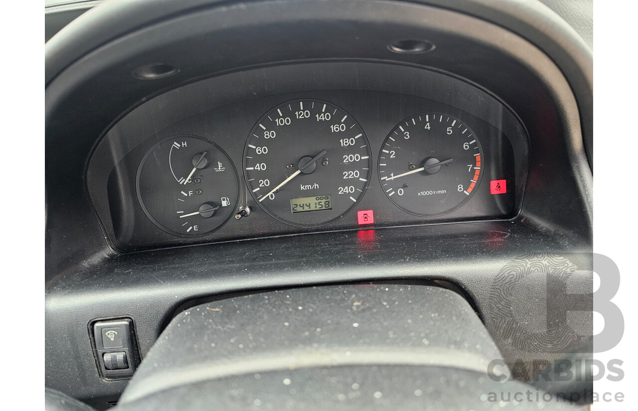 3/1998 Mazda 626 Classic  4d Sedan White 2.0L