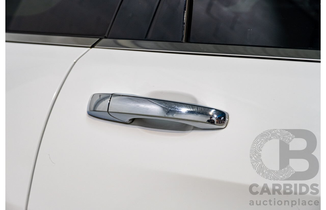 06/2015 Jeep Grand Cherokee Limited (4x4) WK MY15 4d Wagon White Turbo Diesel V6 3.0L