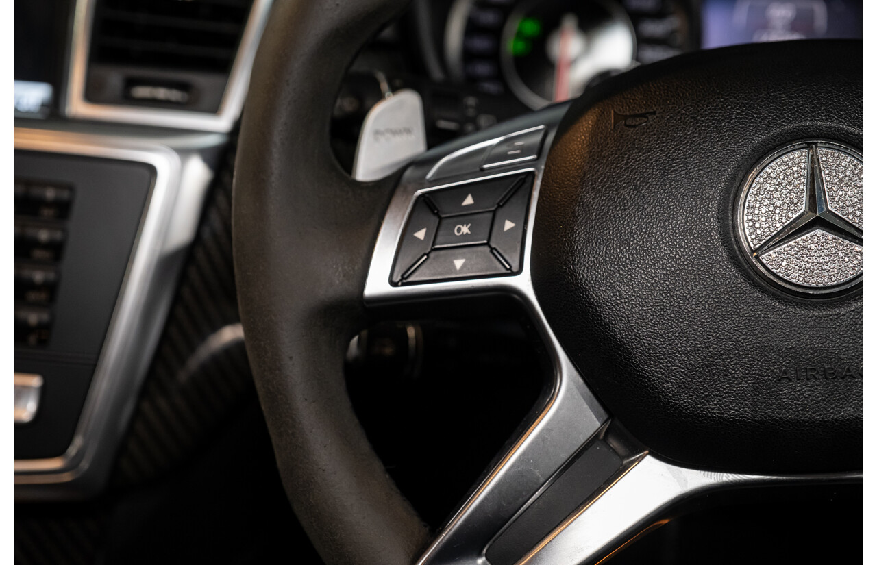 2/2013 Mercedes Benz ML63 AMG (4x4) W166 4d Wagon Palladium Silver Metallic Twin Turbo V8 5.5L