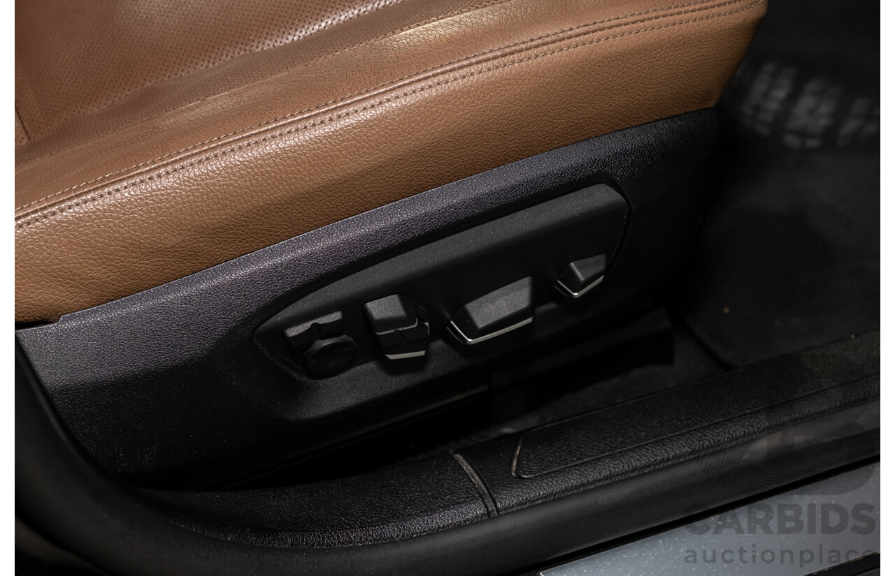 3/2014 BMW 740Li F02 MY14 4d Sedan Black Sapphire Metallic Turbo 3.0L