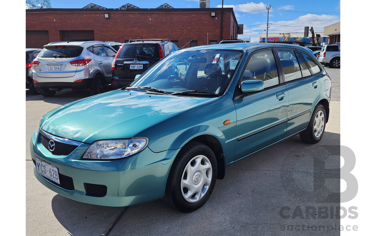 11/2002 Mazda 323 ASTINA FWD  5D Hatchback Green 1.8L