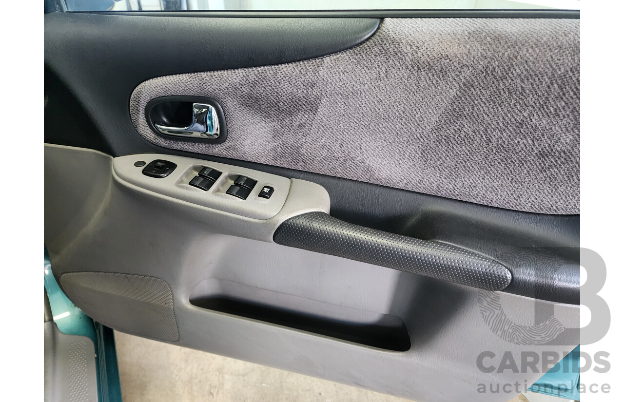 11/2002 Mazda 323 ASTINA FWD  5D Hatchback Green 1.8L