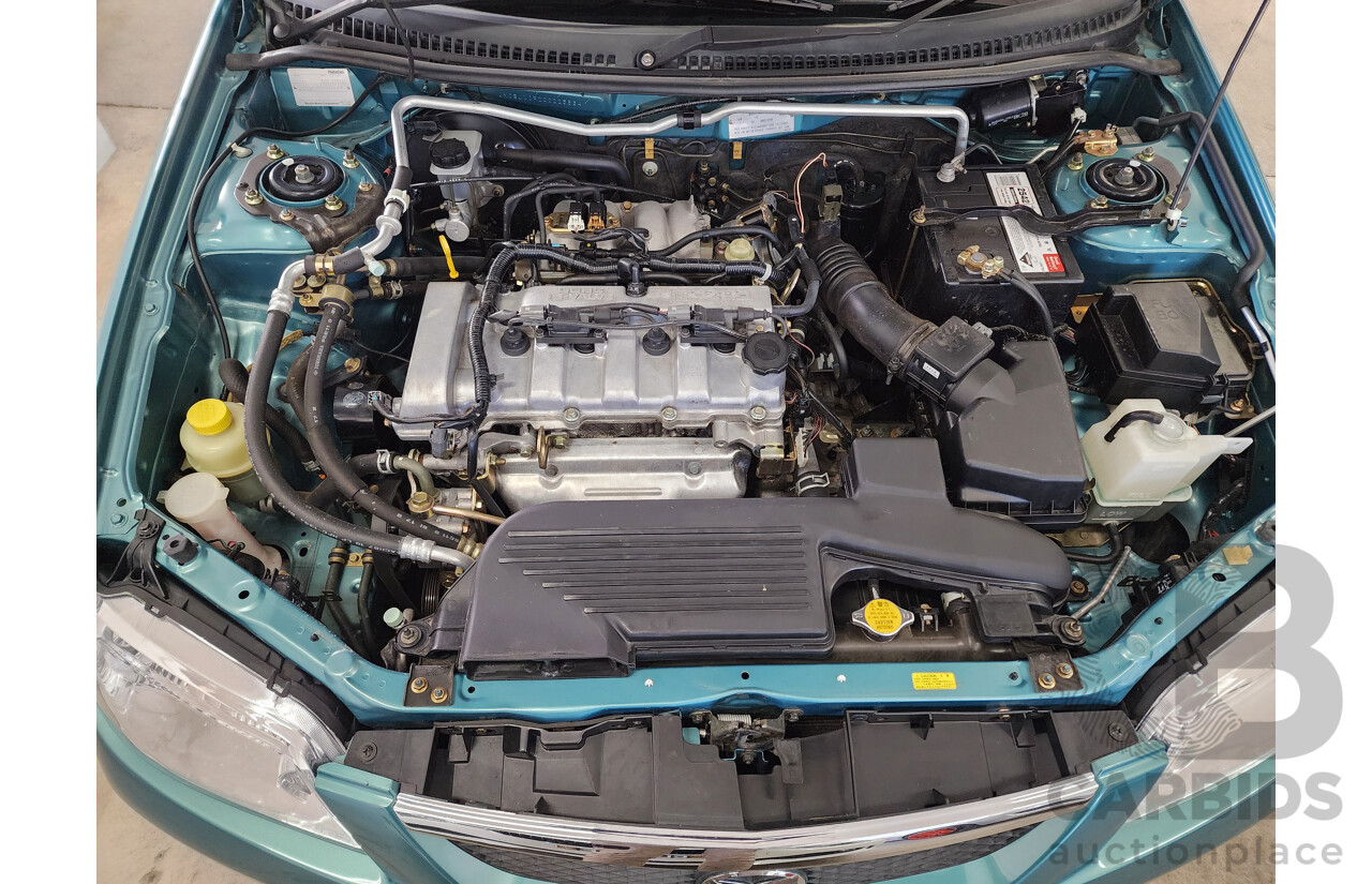 11/2002 Mazda 323 ASTINA FWD  5D Hatchback Green 1.8L