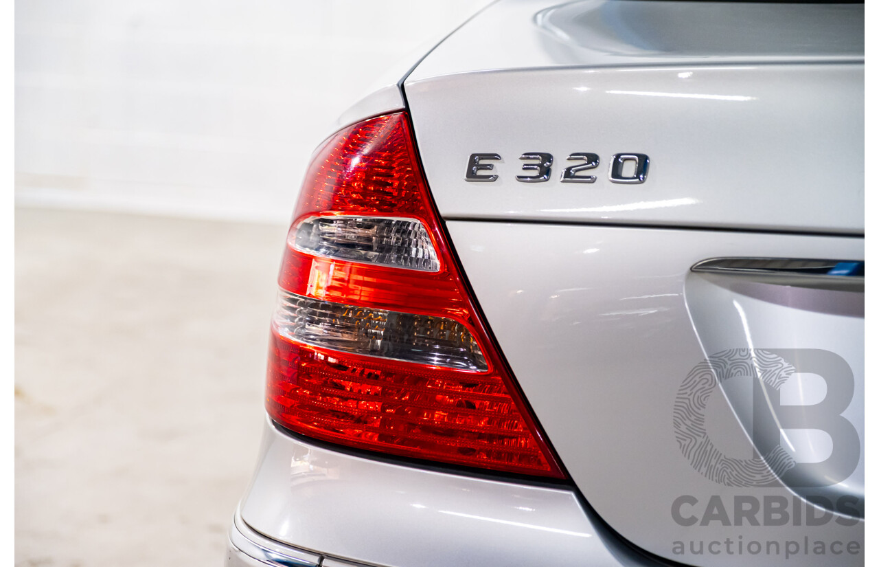 10/2003 Mercedes Benz E320 Elegance 211 4d Sedan Brilliant Silver Metallic V6 3.2L