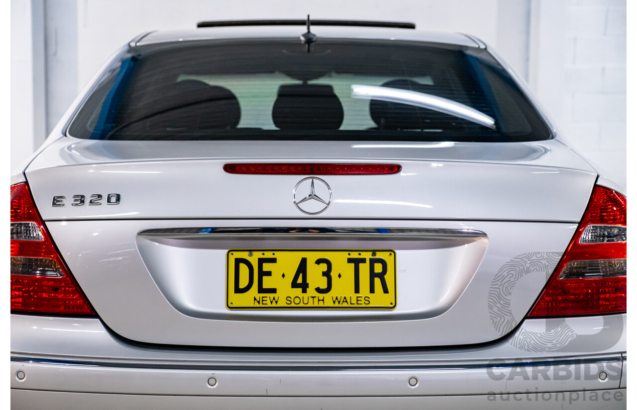 10/2003 Mercedes Benz E320 Elegance 211 4d Sedan Brilliant Silver Metallic V6 3.2L