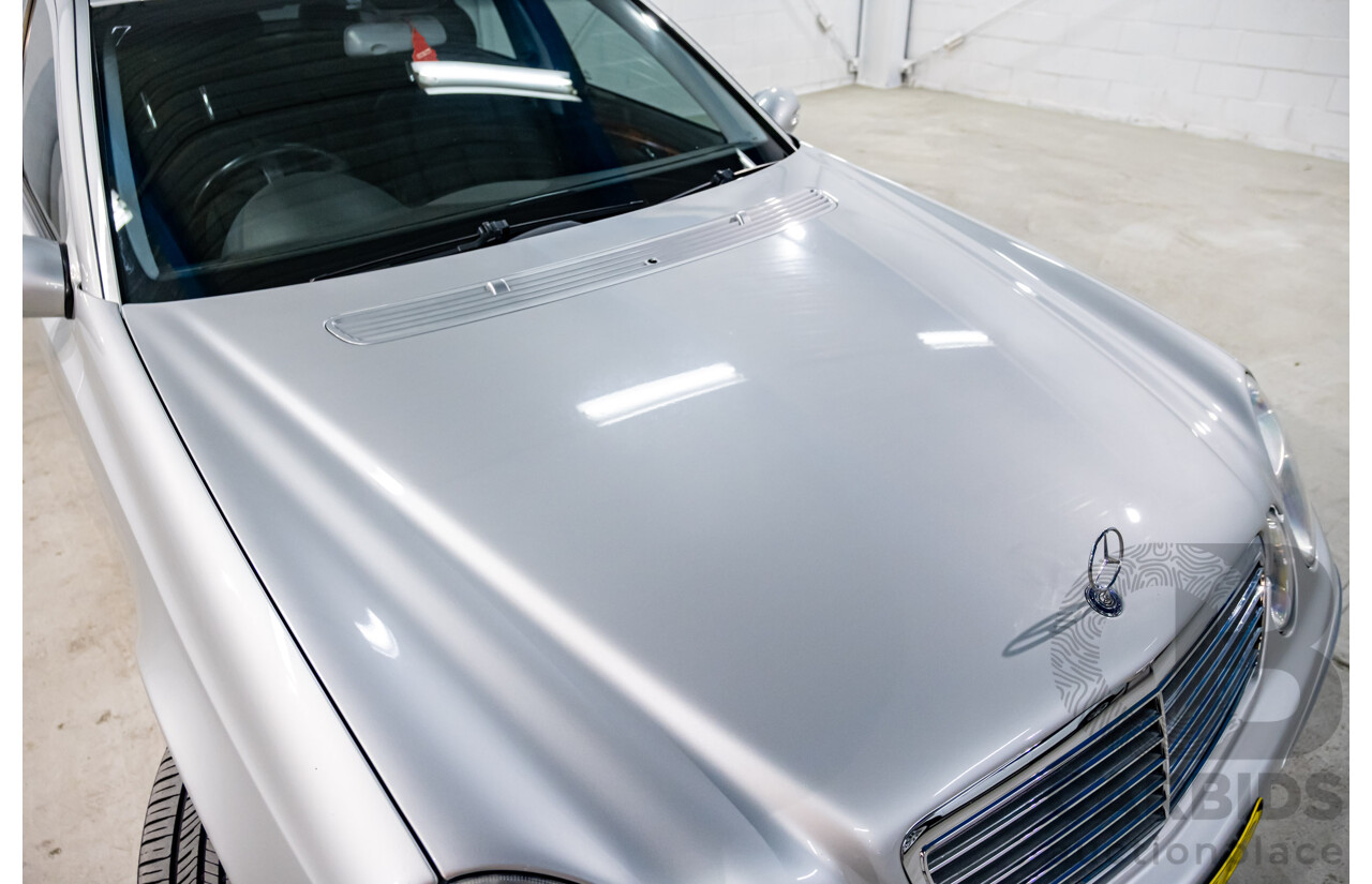 10/2003 Mercedes Benz E320 Elegance 211 4d Sedan Brilliant Silver Metallic V6 3.2L