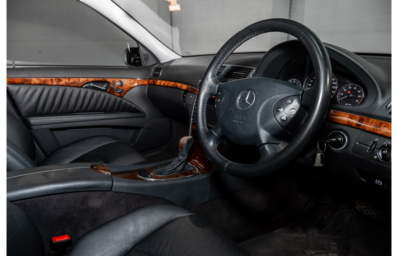 10/2003 Mercedes Benz E320 Elegance 211 4d Sedan Brilliant Silver Metallic V6 3.2L