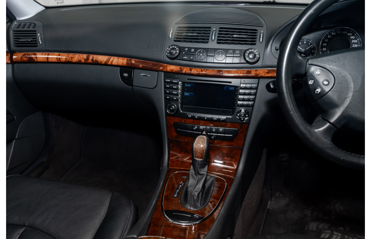 10/2003 Mercedes Benz E320 Elegance 211 4d Sedan Brilliant Silver Metallic V6 3.2L