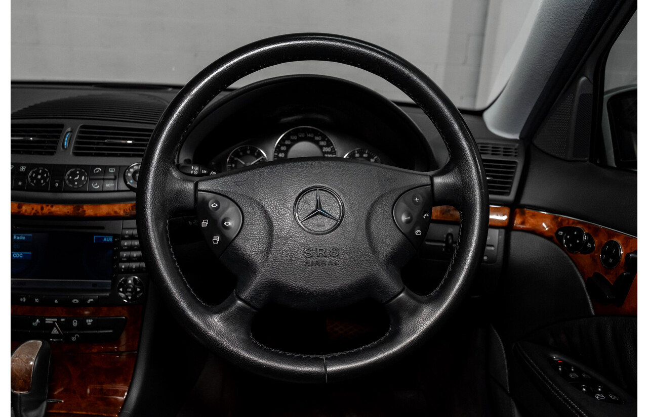 10/2003 Mercedes Benz E320 Elegance 211 4d Sedan Brilliant Silver Metallic V6 3.2L