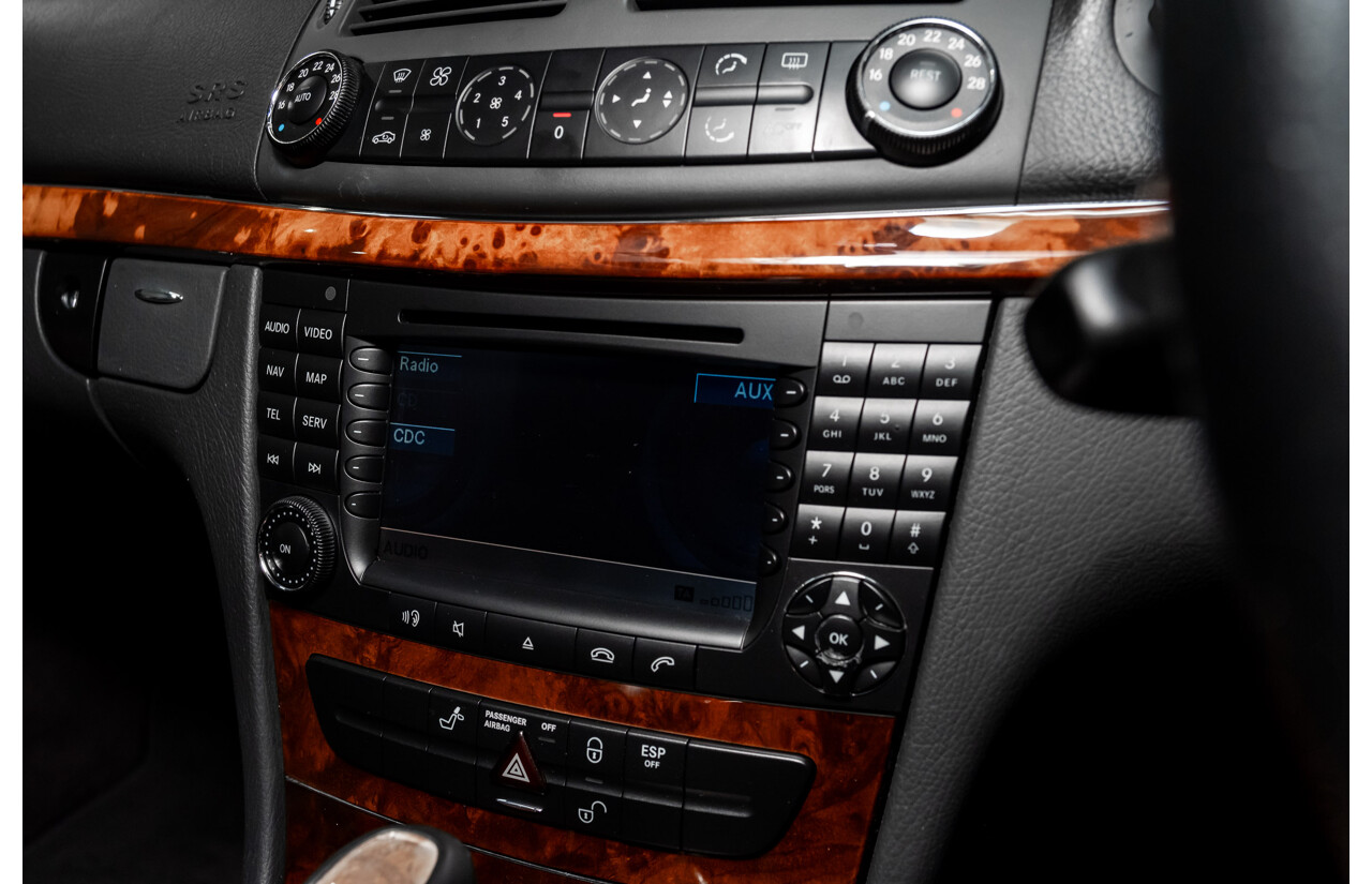 10/2003 Mercedes Benz E320 Elegance 211 4d Sedan Brilliant Silver Metallic V6 3.2L