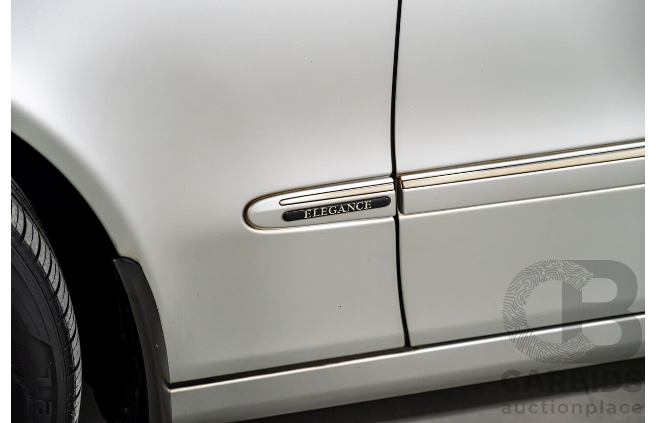 10/2003 Mercedes Benz E320 Elegance 211 4d Sedan Brilliant Silver Metallic V6 3.2L
