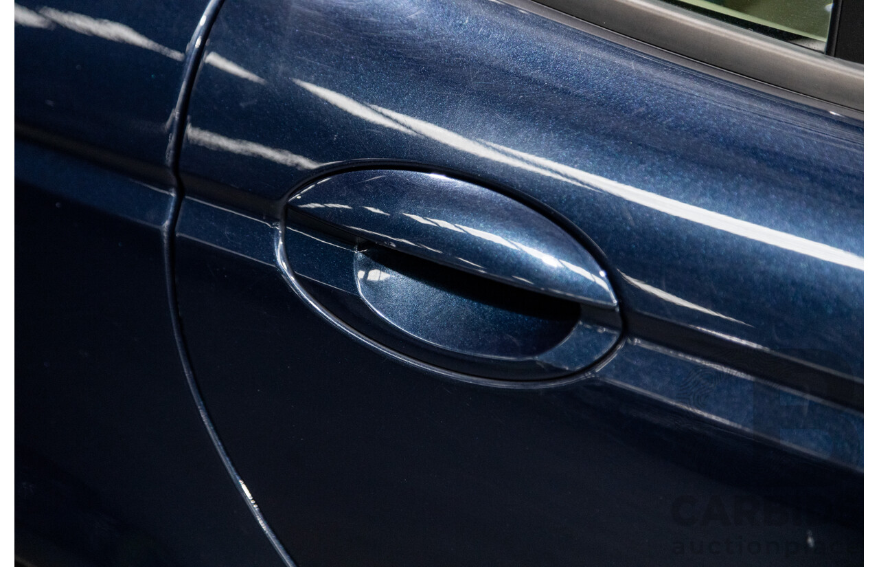 10/2006 Jaguar X Type 2.1 V6 LE MY06 4d Sedan Indigo Blue Metallic V6 2.1L