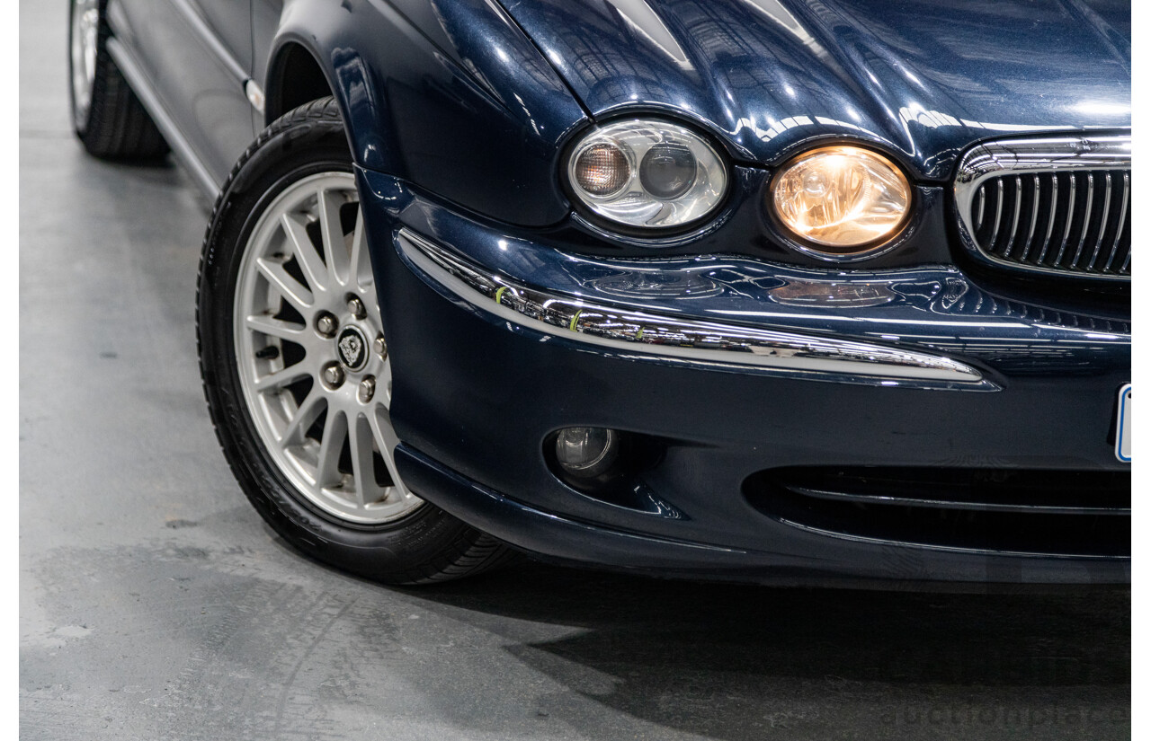 10/2006 Jaguar X Type 2.1 V6 LE MY06 4d Sedan Indigo Blue Metallic V6 2.1L