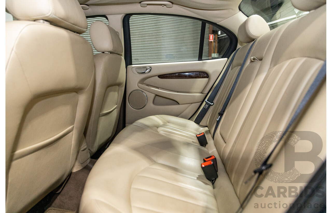 10/2006 Jaguar X Type 2.1 V6 LE MY06 4d Sedan Indigo Blue Metallic V6 2.1L