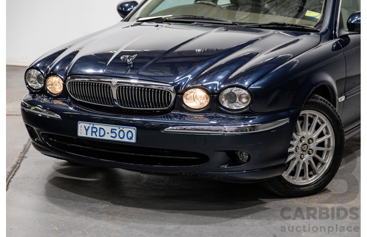 10/2006 Jaguar X Type 2.1 V6 LE MY06 4d Sedan Indigo Blue Metallic V6 2.1L
