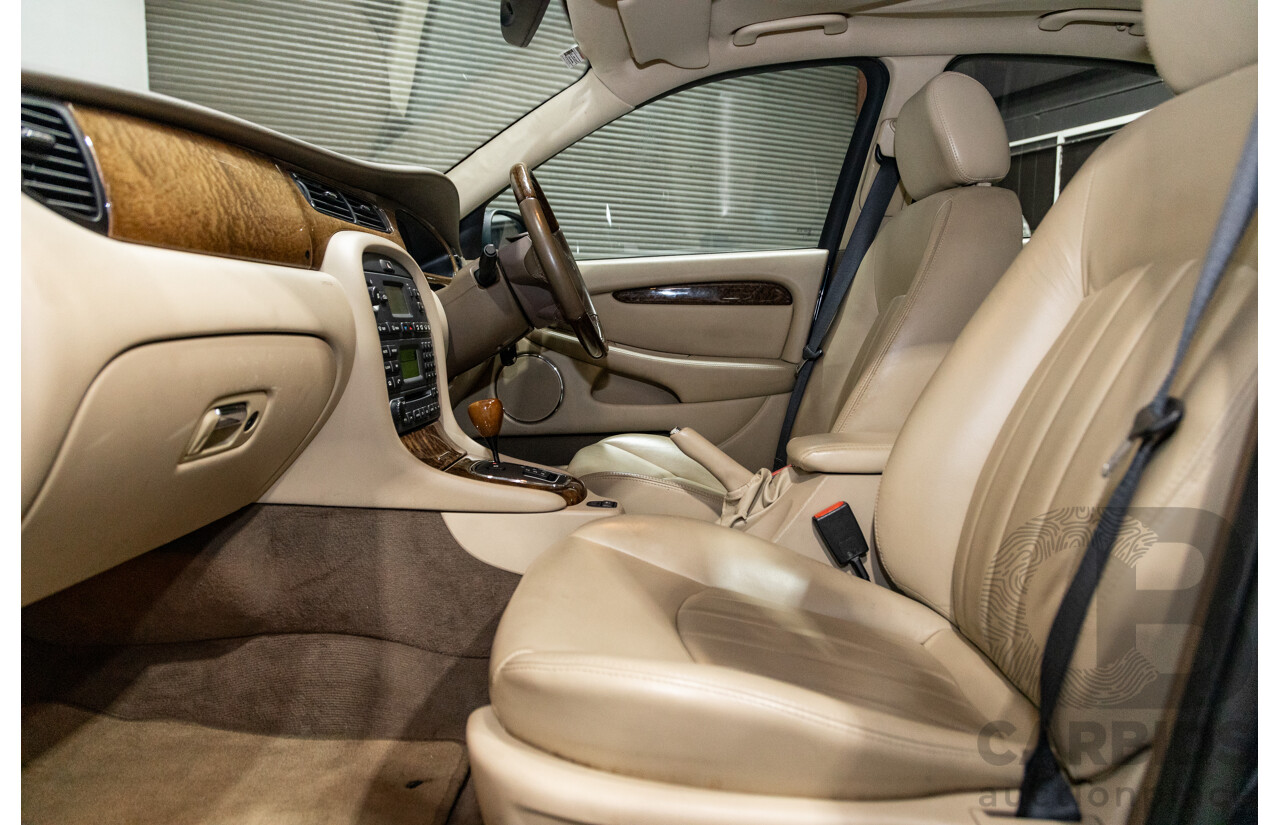 10/2006 Jaguar X Type 2.1 V6 LE MY06 4d Sedan Indigo Blue Metallic V6 2.1L