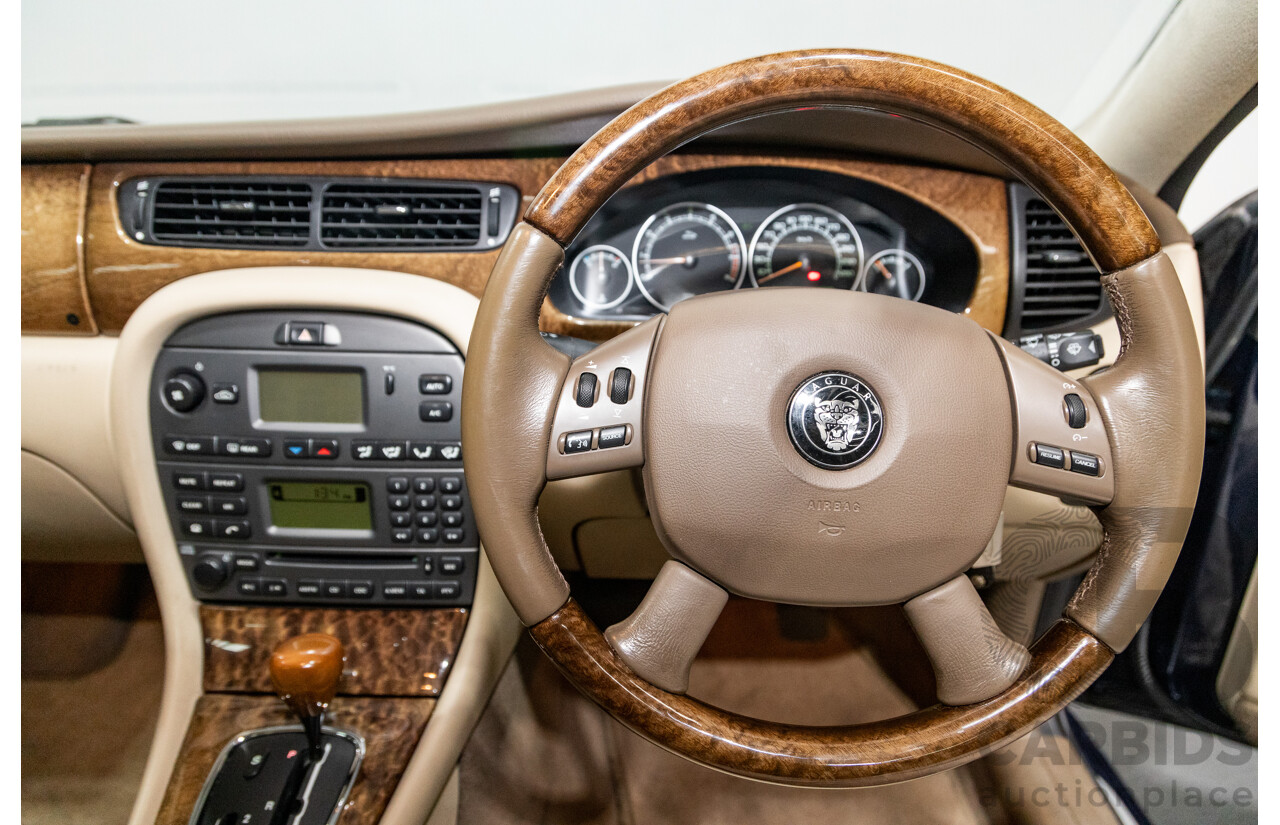 10/2006 Jaguar X Type 2.1 V6 LE MY06 4d Sedan Indigo Blue Metallic V6 2.1L