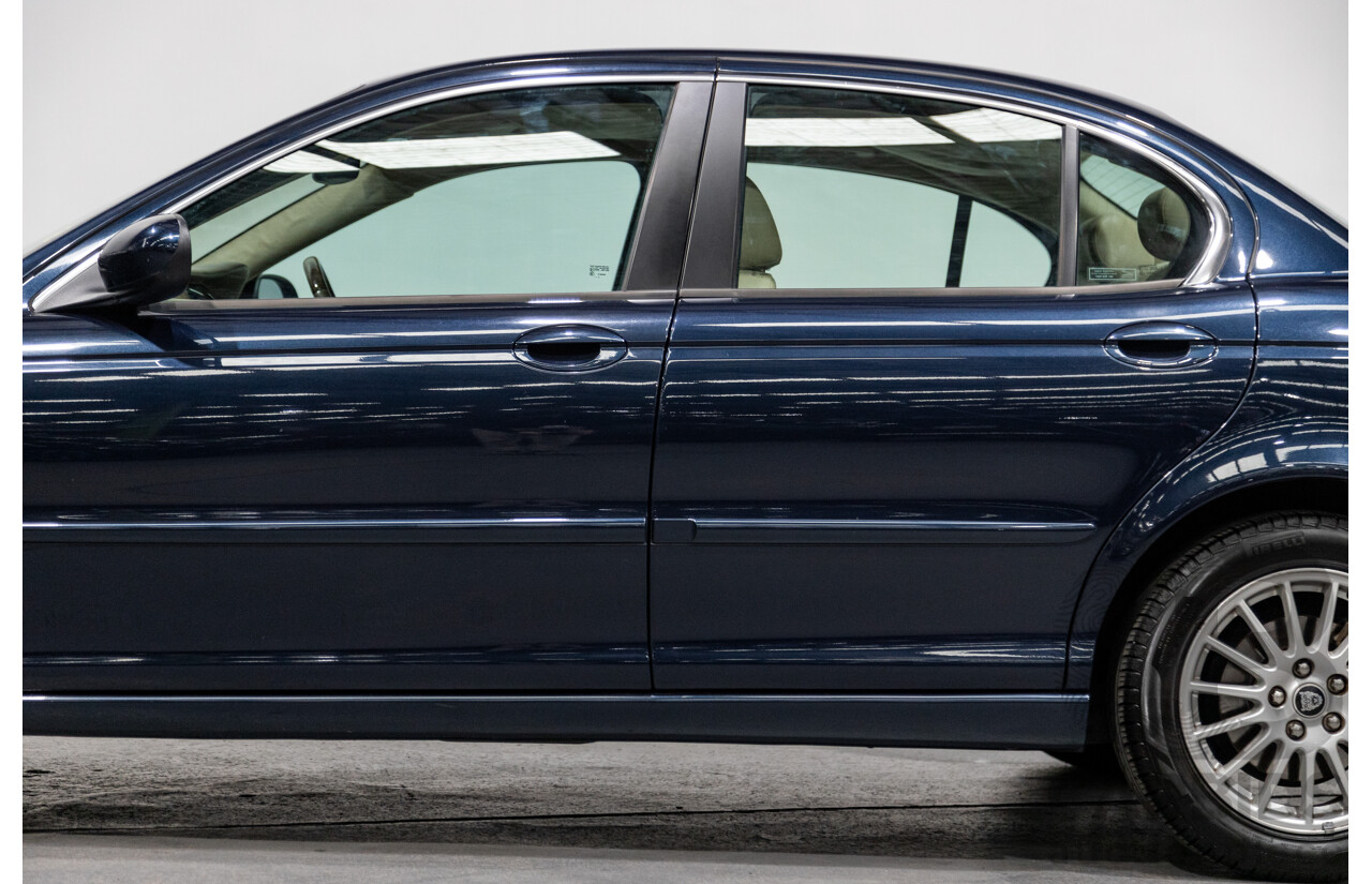 10/2006 Jaguar X Type 2.1 V6 LE MY06 4d Sedan Indigo Blue Metallic V6 2.1L