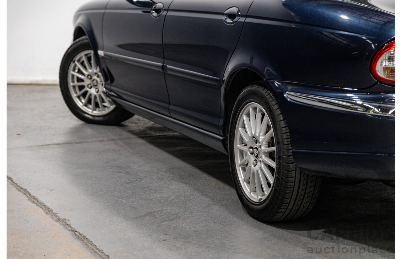 10/2006 Jaguar X Type 2.1 V6 LE MY06 4d Sedan Indigo Blue Metallic V6 2.1L