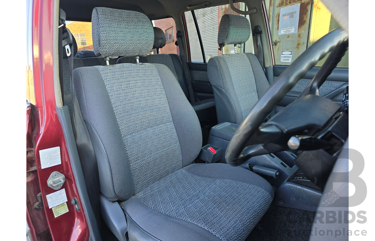 10/1994 Toyota Landcruiser GXL (4x4) FZJ80R 4d Wagon Red 4.5L