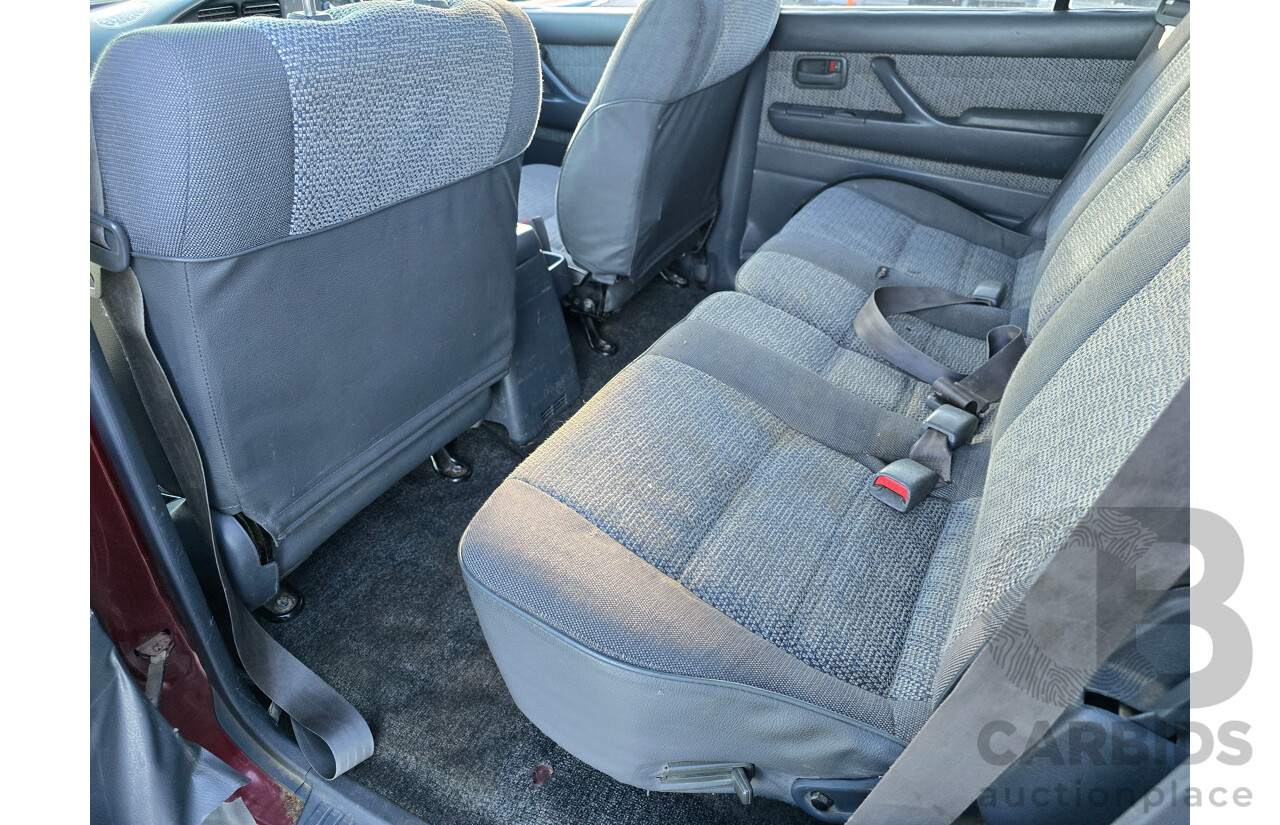 10/1994 Toyota Landcruiser GXL (4x4) FZJ80R 4d Wagon Red 4.5L