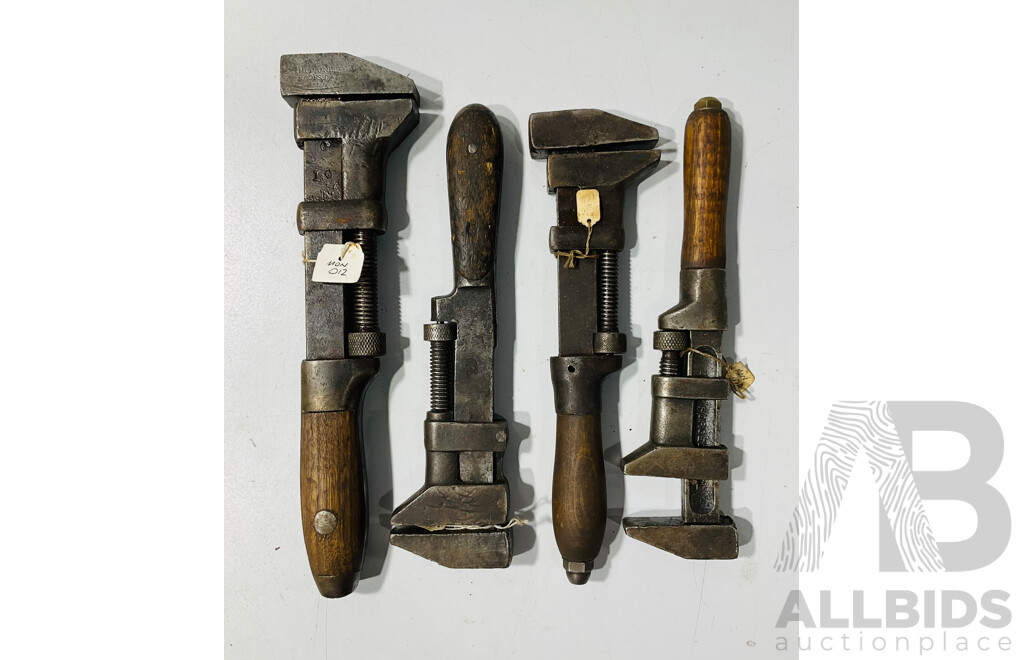 Four Antique Timber Handle Adjustable Wrenches Including Coes and W&B