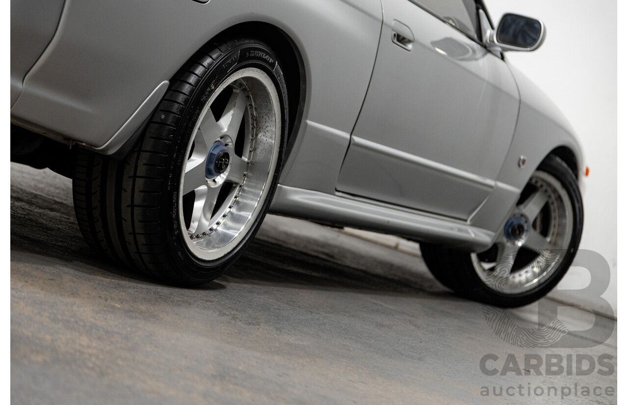 3/1993 Nissan Skyline R32 GT-R BNR32 Series 3 2d Coupe KL0 Spark Silver Metallic Twin Turbo 2.6L - 06/2001 Import