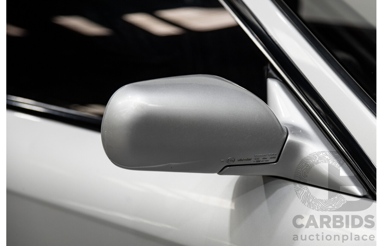 3/1993 Nissan Skyline R32 GT-R BNR32 Series 3 2d Coupe KL0 Spark Silver Metallic Twin Turbo 2.6L - 06/2001 Import