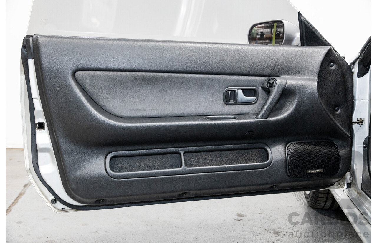 3/1993 Nissan Skyline R32 GT-R BNR32 Series 3 2d Coupe KL0 Spark Silver Metallic Twin Turbo 2.6L - 06/2001 Import