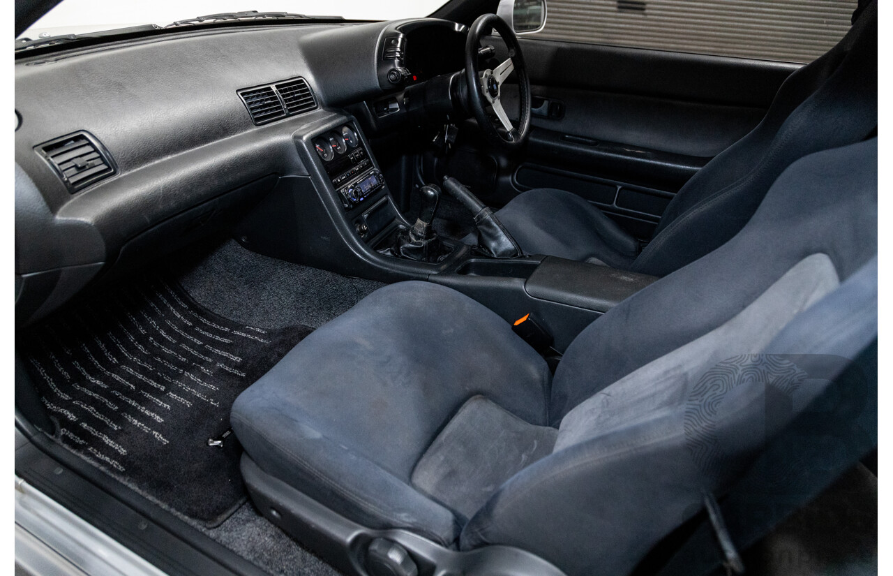 3/1993 Nissan Skyline R32 GT-R BNR32 Series 3 2d Coupe KL0 Spark Silver Metallic Twin Turbo 2.6L - 06/2001 Import