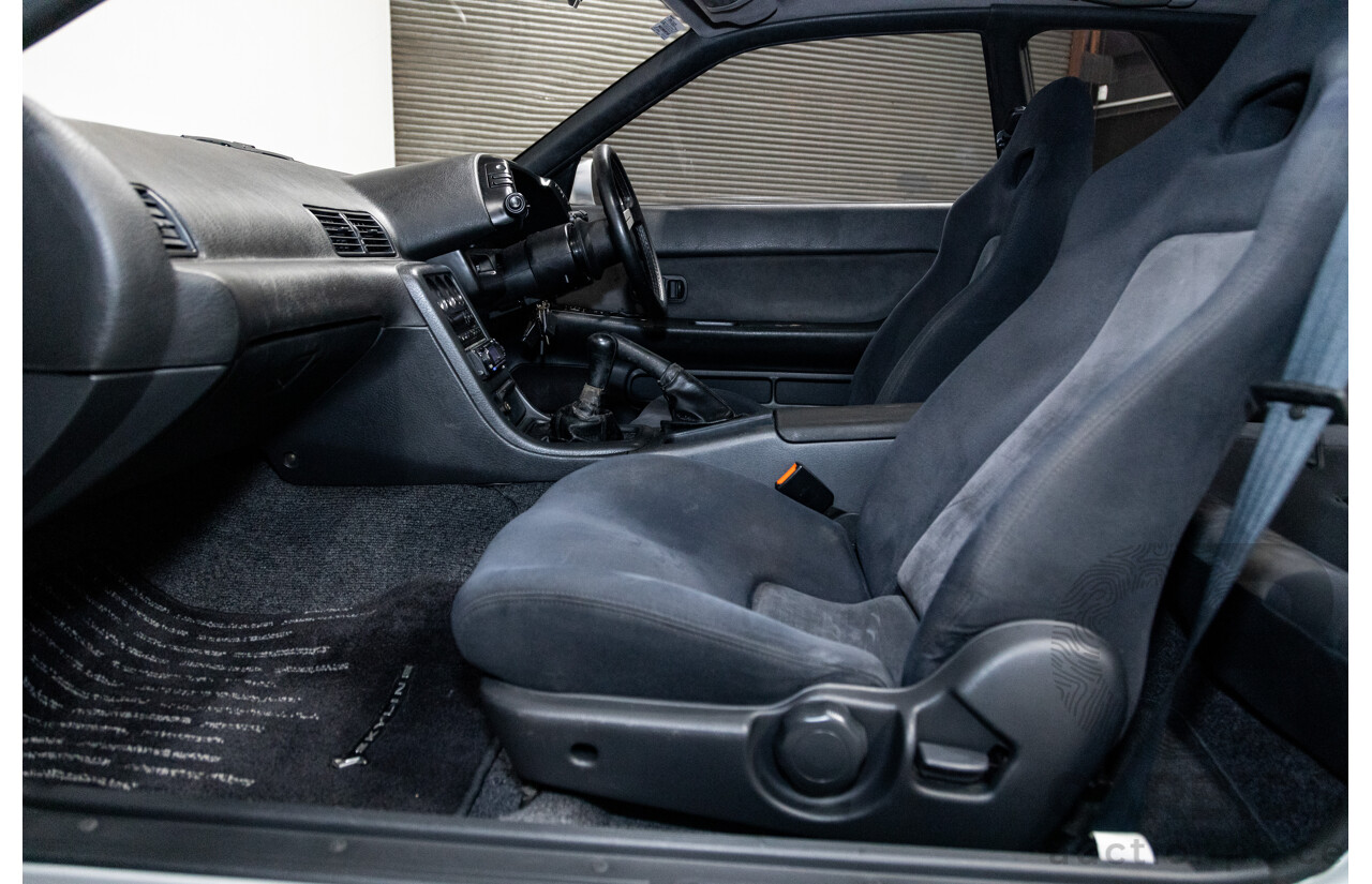 3/1993 Nissan Skyline R32 GT-R BNR32 Series 3 2d Coupe KL0 Spark Silver Metallic Twin Turbo 2.6L - 06/2001 Import