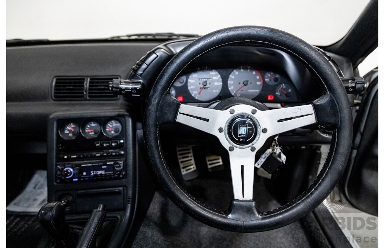 3/1993 Nissan Skyline R32 GT-R BNR32 Series 3 2d Coupe KL0 Spark Silver Metallic Twin Turbo 2.6L - 06/2001 Import