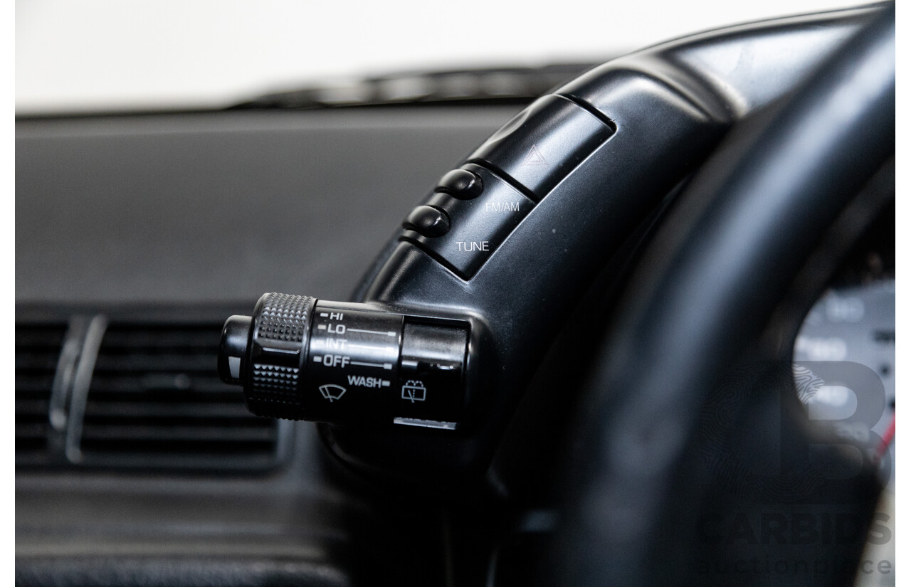 3/1993 Nissan Skyline R32 GT-R BNR32 Series 3 2d Coupe KL0 Spark Silver Metallic Twin Turbo 2.6L - 06/2001 Import