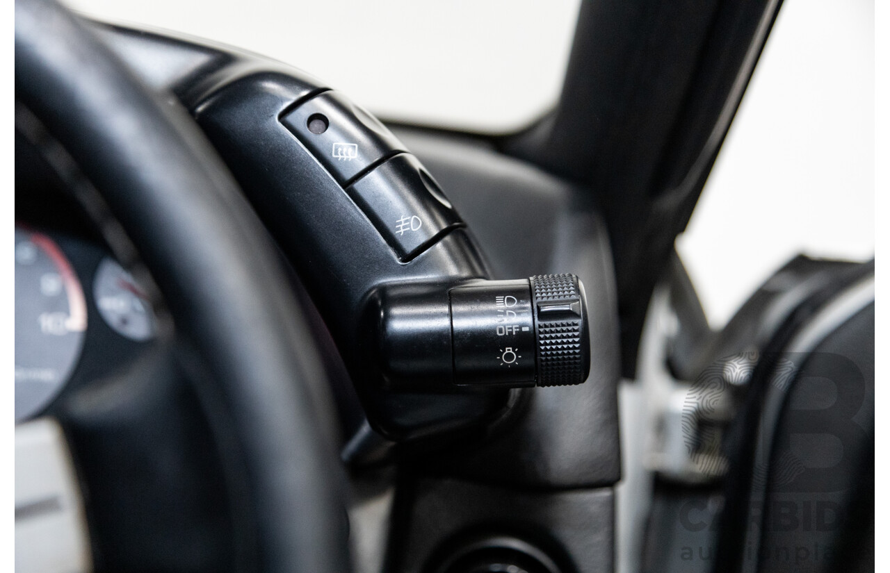 3/1993 Nissan Skyline R32 GT-R BNR32 Series 3 2d Coupe KL0 Spark Silver Metallic Twin Turbo 2.6L - 06/2001 Import