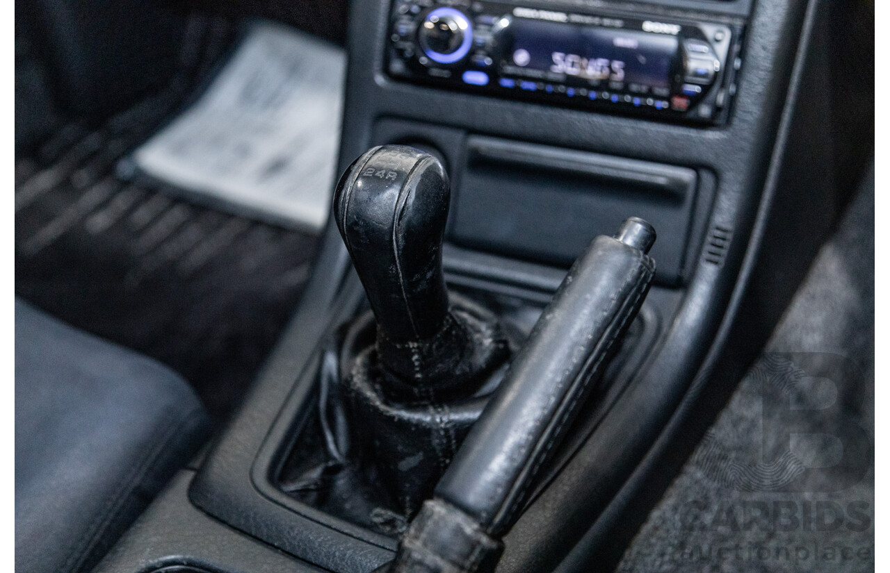 3/1993 Nissan Skyline R32 GT-R BNR32 Series 3 2d Coupe KL0 Spark Silver Metallic Twin Turbo 2.6L - 06/2001 Import