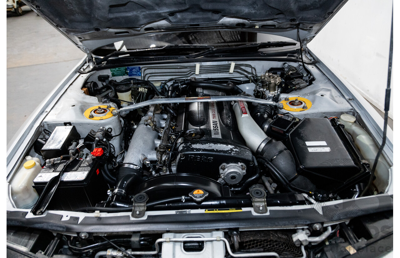 3/1993 Nissan Skyline R32 GT-R BNR32 Series 3 2d Coupe KL0 Spark Silver Metallic Twin Turbo 2.6L - 06/2001 Import