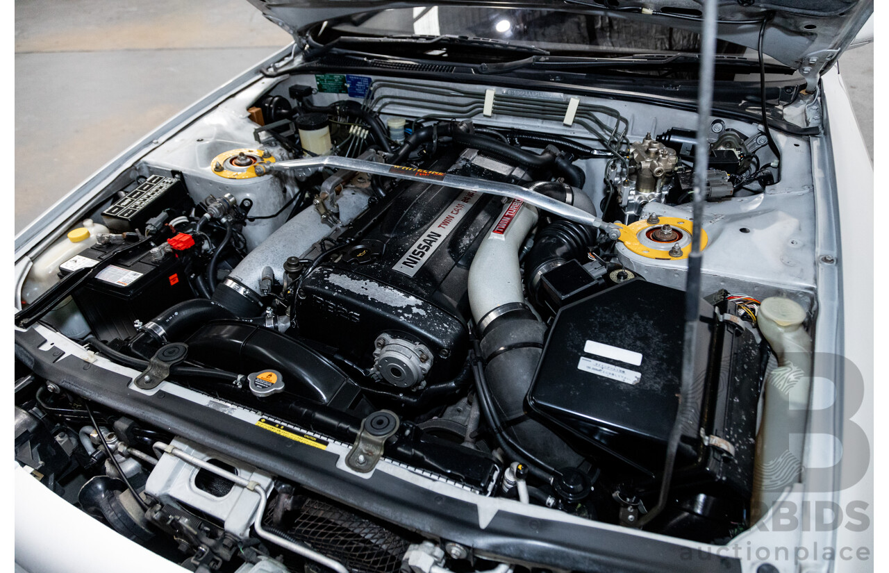 3/1993 Nissan Skyline R32 GT-R BNR32 Series 3 2d Coupe KL0 Spark Silver Metallic Twin Turbo 2.6L - 06/2001 Import