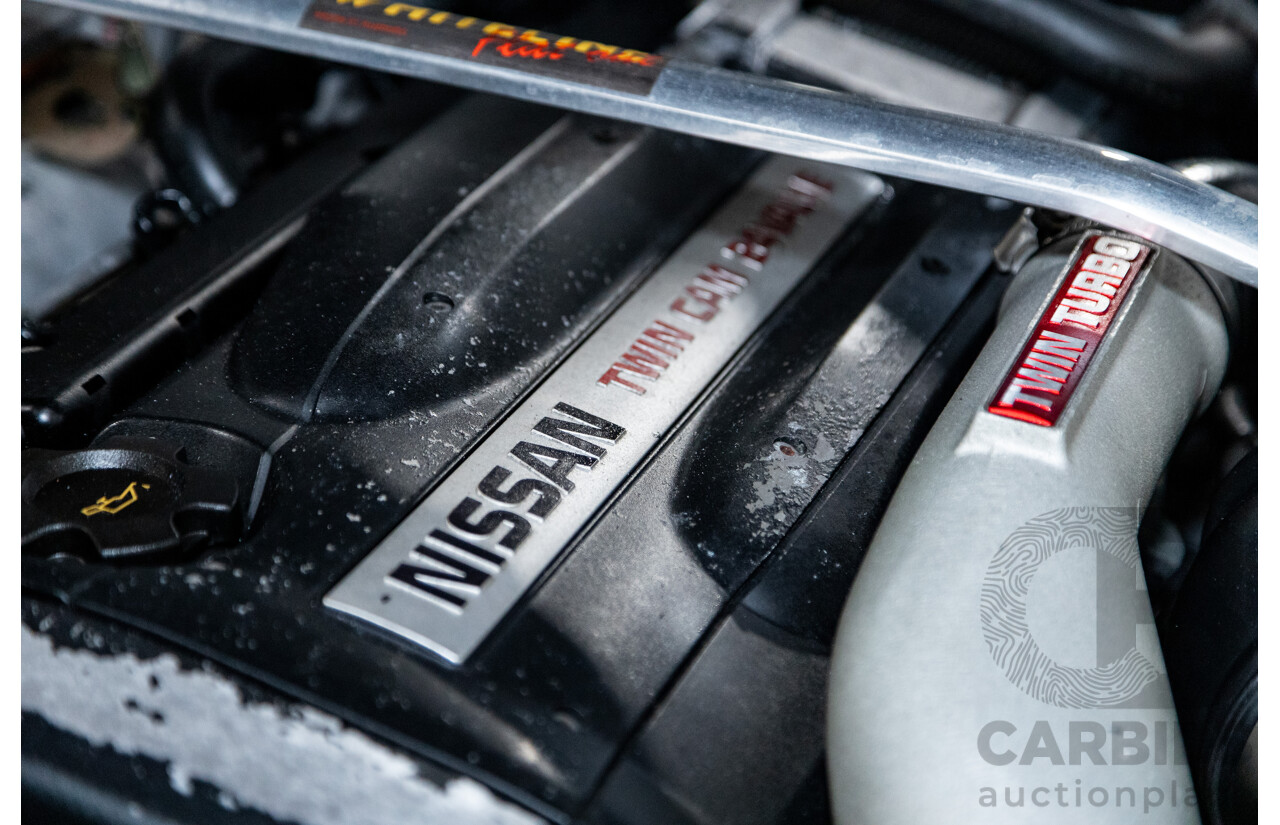 3/1993 Nissan Skyline R32 GT-R BNR32 Series 3 2d Coupe KL0 Spark Silver Metallic Twin Turbo 2.6L - 06/2001 Import