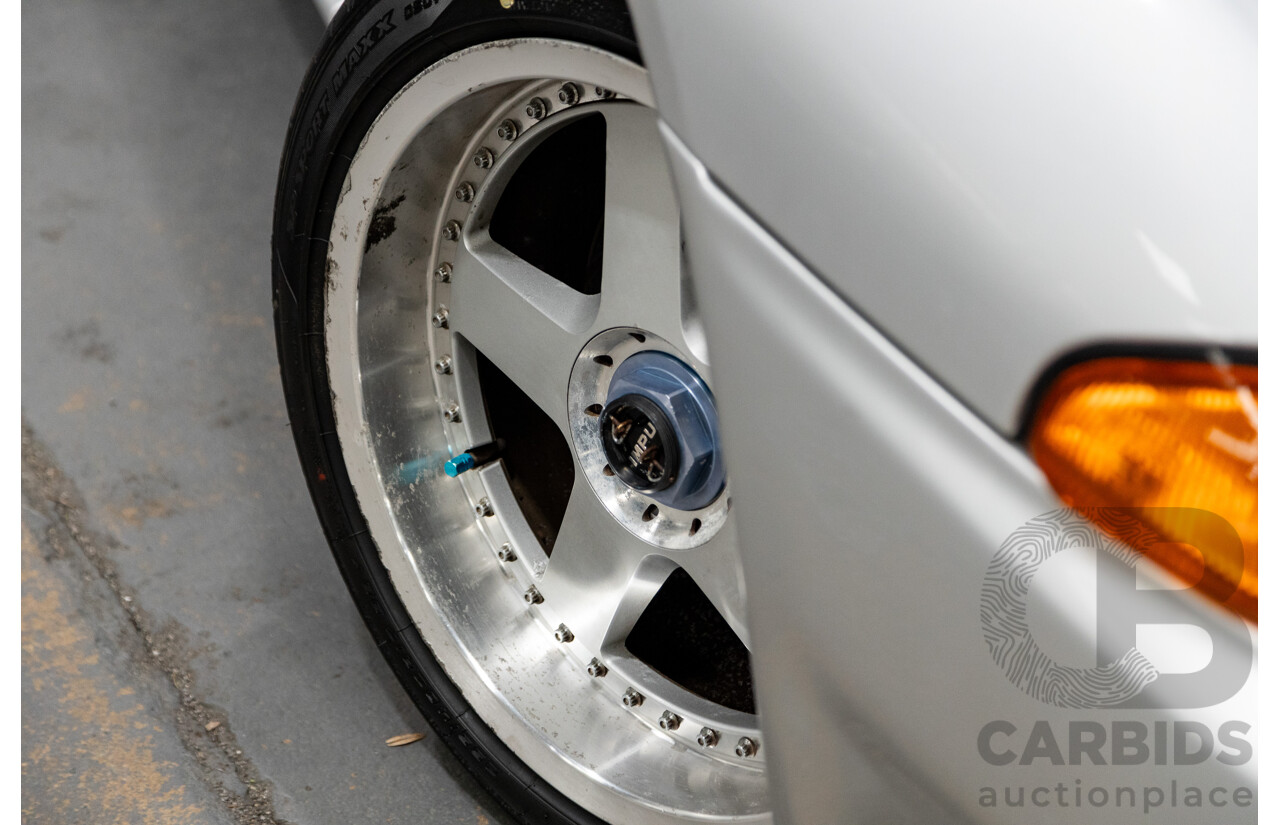 3/1993 Nissan Skyline R32 GT-R BNR32 Series 3 2d Coupe KL0 Spark Silver Metallic Twin Turbo 2.6L - 06/2001 Import