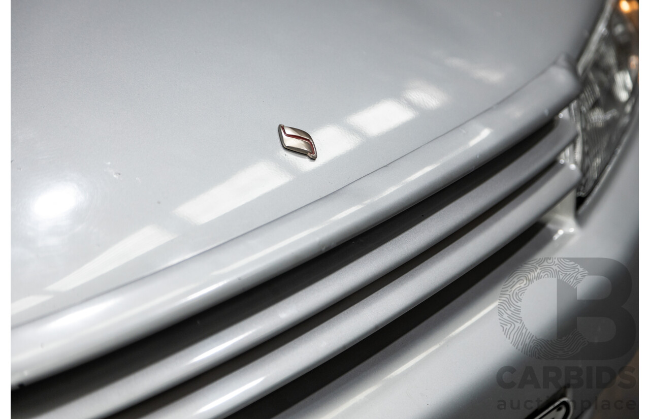 3/1993 Nissan Skyline R32 GT-R BNR32 Series 3 2d Coupe KL0 Spark Silver Metallic Twin Turbo 2.6L - 06/2001 Import