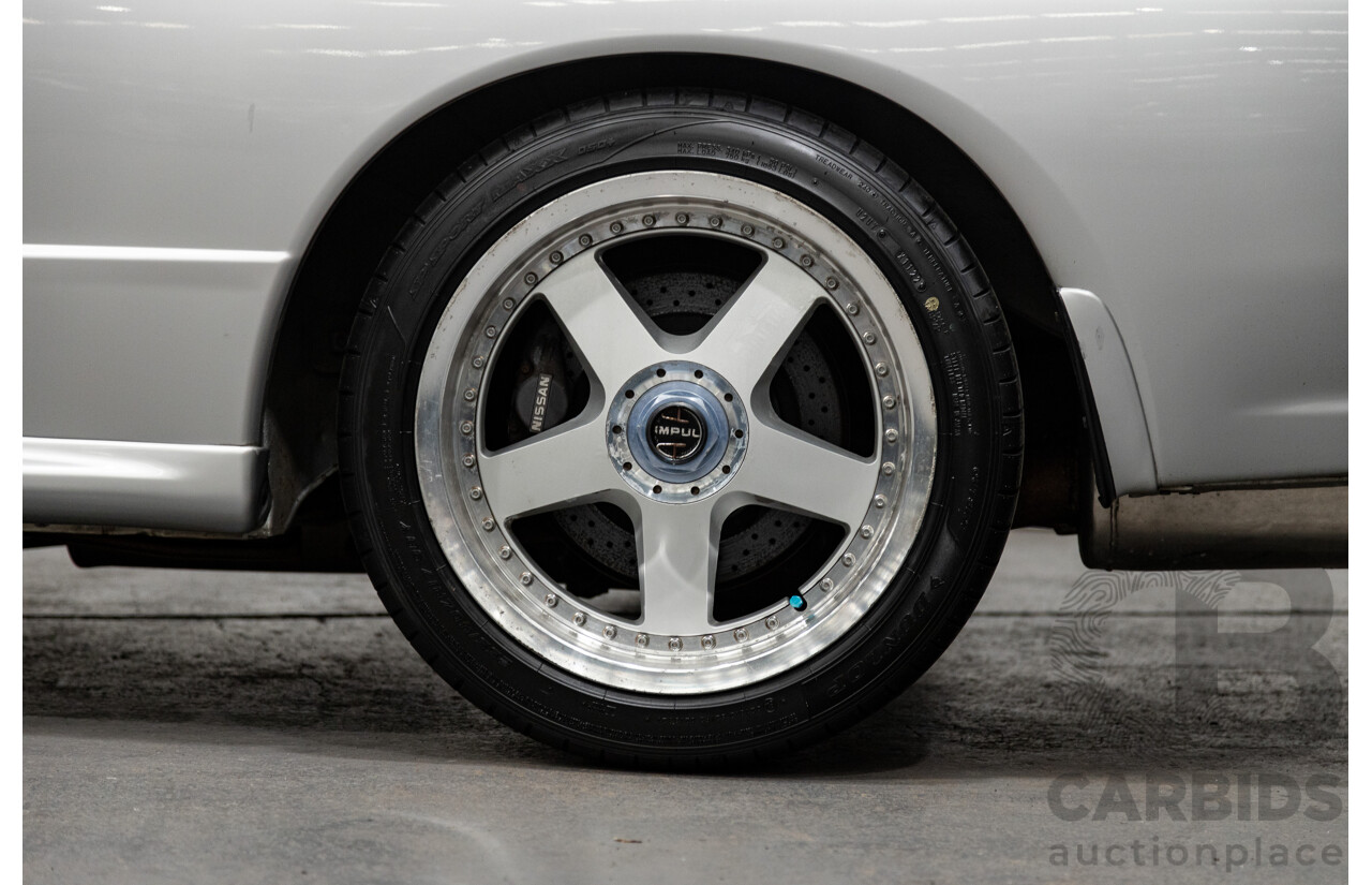 3/1993 Nissan Skyline R32 GT-R BNR32 Series 3 2d Coupe KL0 Spark Silver Metallic Twin Turbo 2.6L - 06/2001 Import
