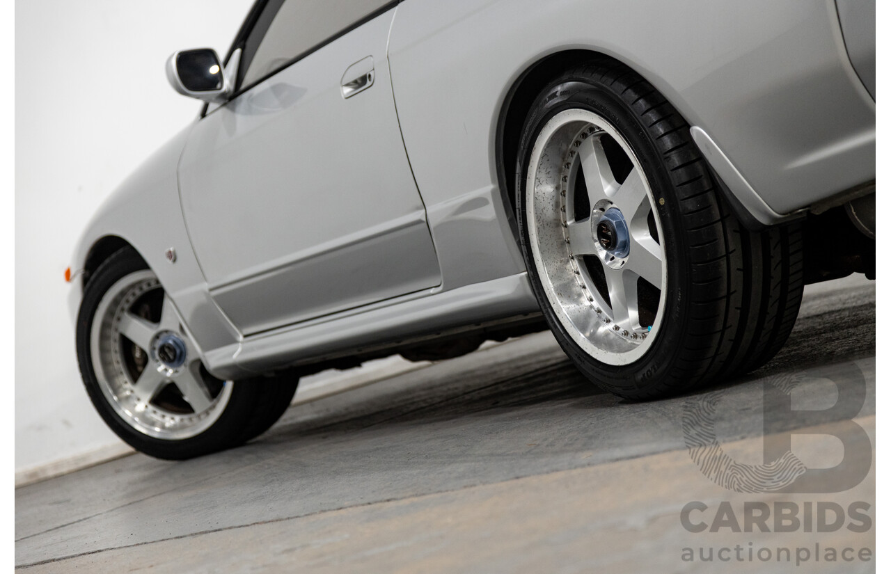 3/1993 Nissan Skyline R32 GT-R BNR32 Series 3 2d Coupe KL0 Spark Silver Metallic Twin Turbo 2.6L - 06/2001 Import