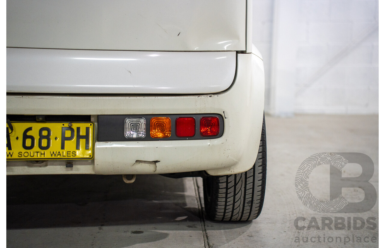 11/2004 Nissan Cube BGZ11 4d Wagon White 1.4L -  Used Import (dated 11/2004)