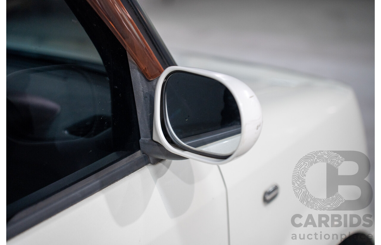 11/2004 Nissan Cube BGZ11 4d Wagon White 1.4L -  Used Import (dated 11/2004)