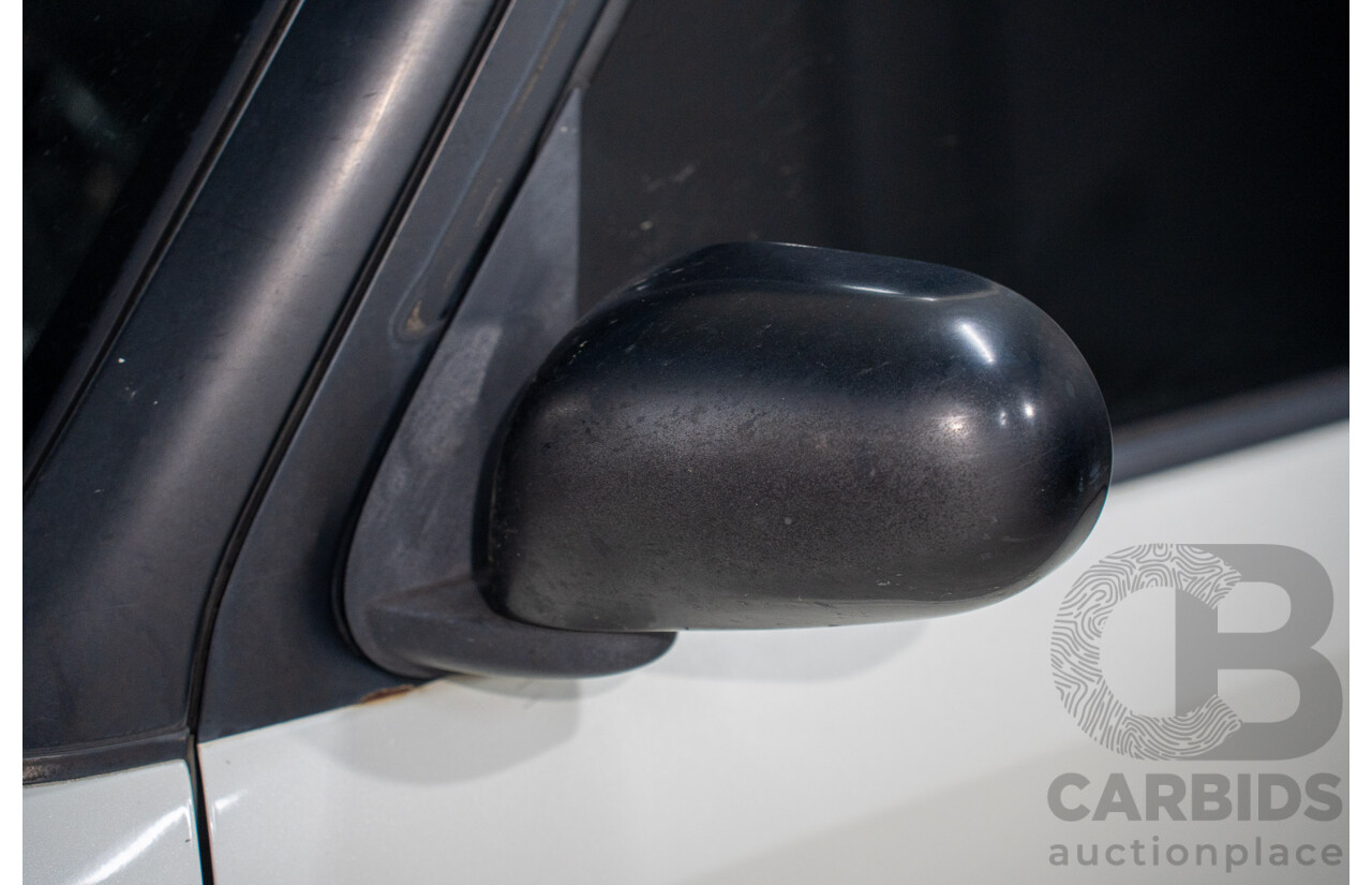 11/2004 Nissan Cube BGZ11 4d Wagon White 1.4L -  Used Import (dated 11/2004)