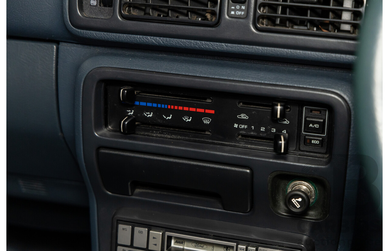 7/1990 Ford Telstar TX5 GHIA AV 5d Hatchback Jeans Blue 2.2L