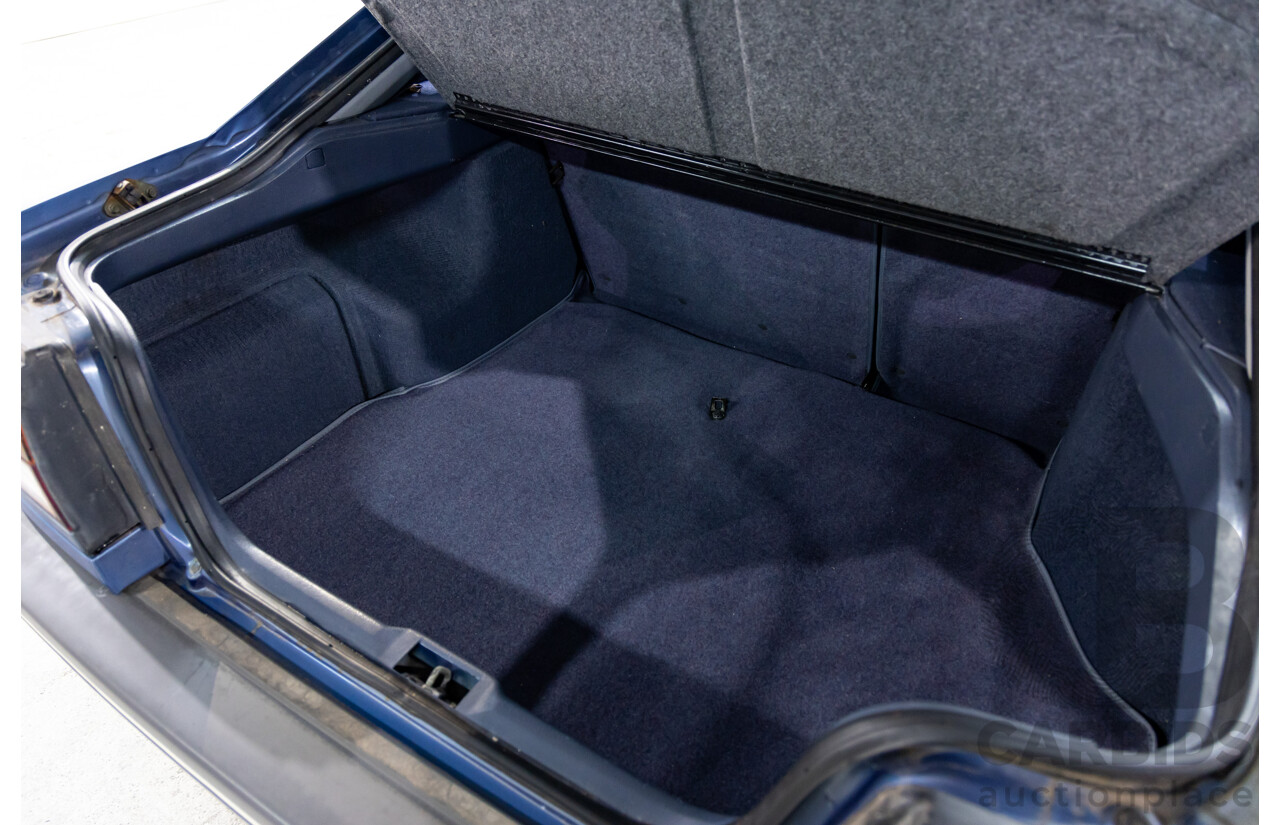 7/1990 Ford Telstar TX5 GHIA AV 5d Hatchback Jeans Blue 2.2L