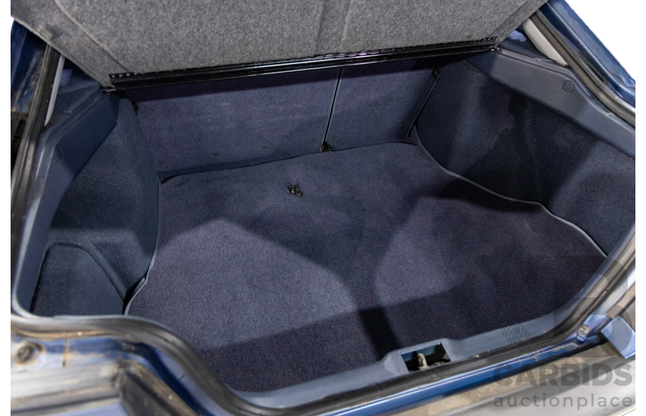 7/1990 Ford Telstar TX5 GHIA AV 5d Hatchback Jeans Blue 2.2L