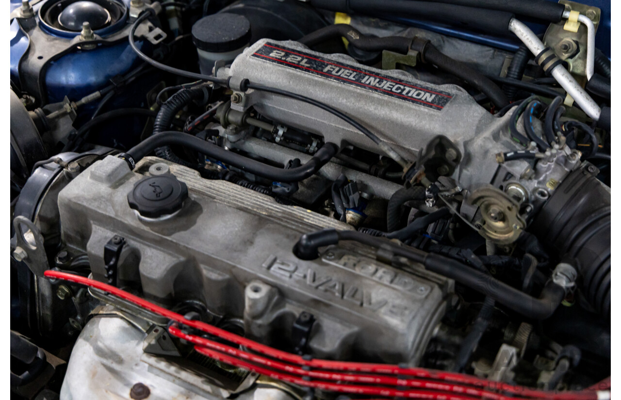 7/1990 Ford Telstar TX5 GHIA AV 5d Hatchback Jeans Blue 2.2L