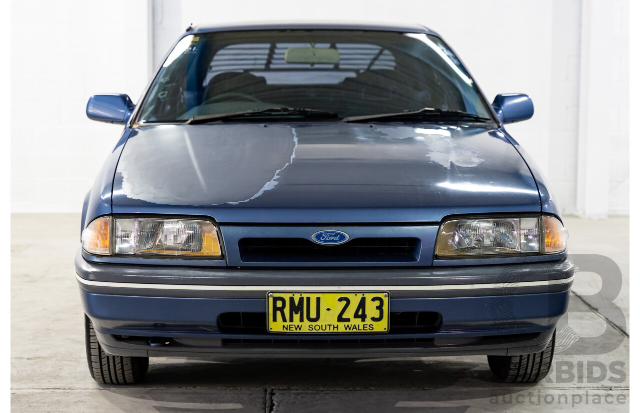 7/1990 Ford Telstar TX5 GHIA AV 5d Hatchback Jeans Blue 2.2L